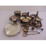 A quantity of silver plate to include trays, dishes, an ice bucket and condiments
