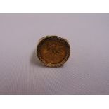 A 1912 half sovereign ring set in 9ct gold, approx total weight 8.2g