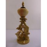 A Royal Worcester porcelain oil lamp with figurines of a boy, girl and frog under a tree, signed
