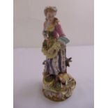 Sitzendorf figurine of a lady with a lamb, on raised plinth, marks to the base