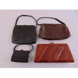 Four ladies handbags to include three leather and an Art Deco grosgrain and brass handbag