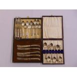 A quantity of silver to include cased teaspoons, dessert knives and forks