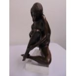 A limited edition bronze scuplture titled Solitude by Tom Merrifield with certificate, one of only