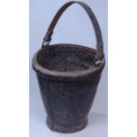 A 19th century leather bucket with a leather swing