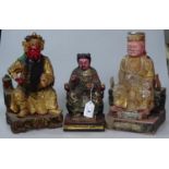 2 carved and painted wood Oriental seated figures,