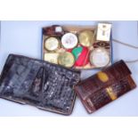 Compacts, a crocodile skin bag etc