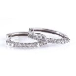 A pair of 14ct white gold diamond line hoop earrings, height 22.7mm, 5g