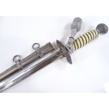 A German Second War Period Luftwaffe dagger, composition grips and nickel plate mounts, with