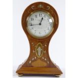 An Art Nouveau mahogany balloon-cased mantel clock, with inlaid brass and mother-of-pearl marquetry,