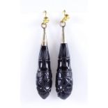 A pair of Antique carved jet drop earrings, with gilt-metal fittings, height excluding fitting 36.