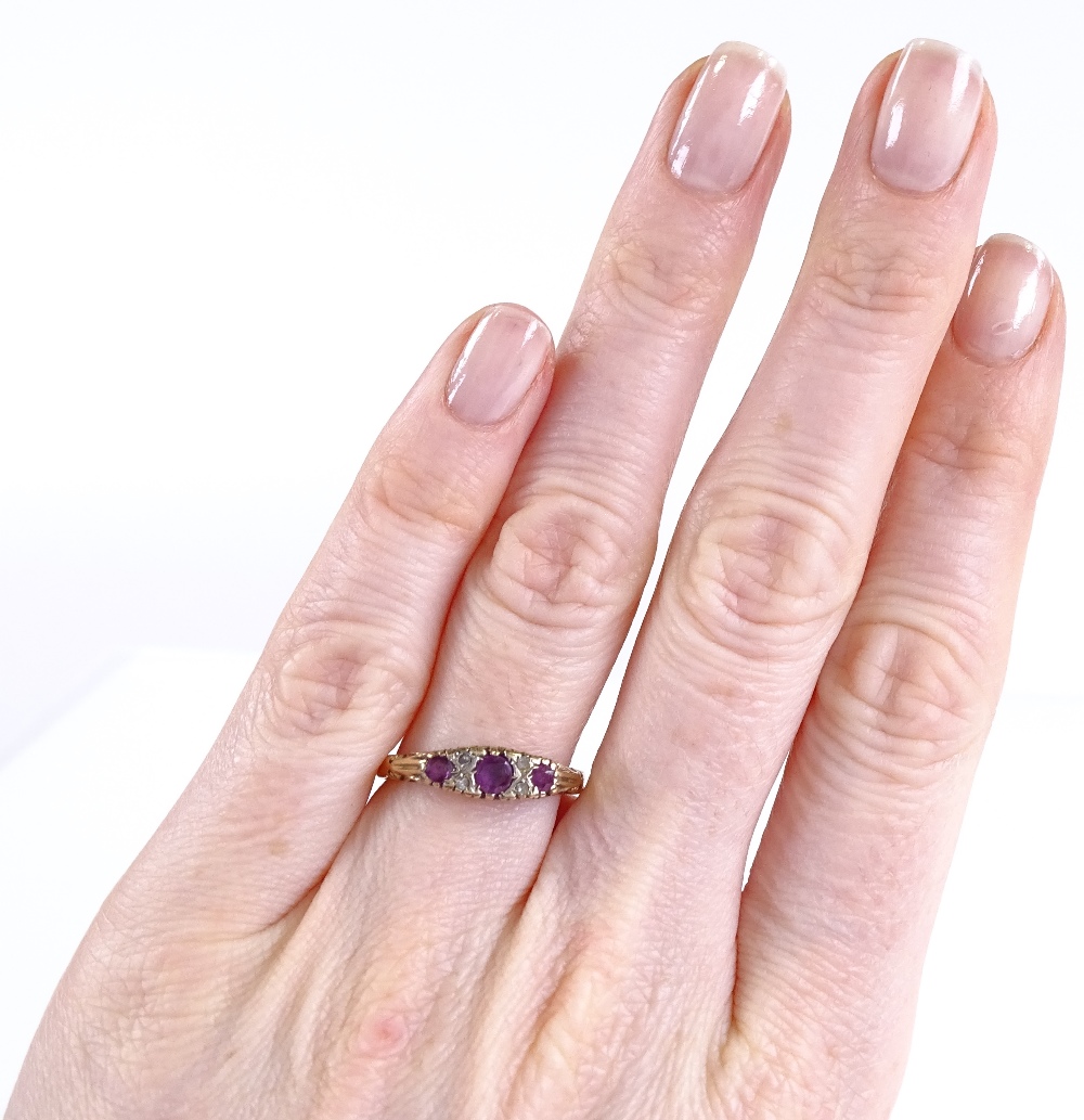 A 9ct gold 7-stone ruby and diamond ring, setting height 5mm, size O, 2.7g - Image 4 of 4