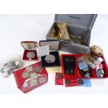 A collection of British and American coins, including silver commemorative and British silver coins