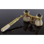 A pair of 19th century mother-of-pearl and brass opera glasses, with telescopic handle