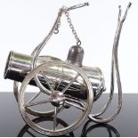 A novelty electroplate brandy warmer, in the form of a cannon, length 12cm