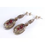 A pair of Antique Pinchbeck garnet earrings, with pierced drops and leaf decoration, height