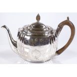 A George III silver teapot, with corner vertical fluting and carved ivory pineapple finial, by