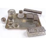 A rectangular engine turned silver tray, together with various silver-topped dressing table jars,