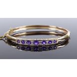 A 9ct gold graduated amethyst and diamond hinged bangle, with scripted bridge "with all my love