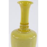 A small Chinese porcelain yellow glazed narrow-neck vase, height 14cm