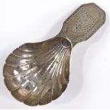 A George III silver caddy spoon, with shell design bowl and bright-cut handle, by William Burch,