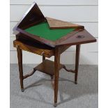 An Edwardian rosewood and marquetry inlaid envelope card table, with frieze drawers and tapered legs