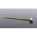 An unmarked gold solitaire old-cut diamond stickpin, diamond dimensions approx 4.92mm x 4.24mm x 2.