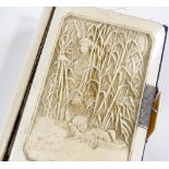 A Victorian Bible with fine relief carved ivory cover, depicting Moses among the bulrushes, height