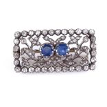 A 19th century sapphire and diamond cluster brooch, total diamond content approx 1.02ct, silver