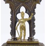 A Victorian Gothic design bronze pocket watch stand, surmounted by a knight in armour, height 18cm