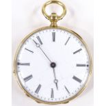 A Swiss unmarked gold open-face key-wind fob watch, with engine turned case and white enamel dial,