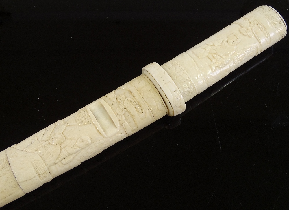 A Japanese early 20th century dagger, carved bone handle and scabbard, overall length 36cm