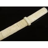 A Japanese early 20th century dagger, carved bone handle and scabbard, overall length 36cm