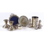 Various silver items including a beaker, pepperettes, picture frames etc, 8.4oz weighable
