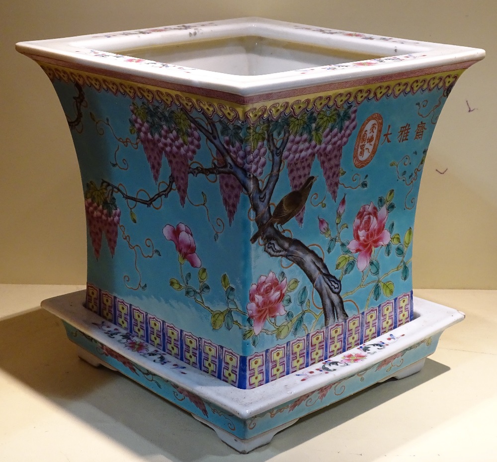 A Chinese dayazhai turquoise ground porcelain jardiniere and stand, hand painted enamel birds and