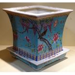 A Chinese dayazhai turquoise ground porcelain jardiniere and stand, hand painted enamel birds and