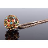 A 14ct gold gemstone set ball pendant, set with turquoise, coral and coloured glass beads,