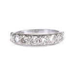 An 18ct white gold diamond half eternity ring, total diamond content approx 1ct, setting height 4.