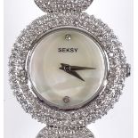 A lady's Sekonda Seksy Quartz wristwatch, stainless steel case with mother-of-pearl dial,