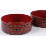 A pair of Regency papier-mache wine coasters with reeded surrounds, diameter 13.5cm