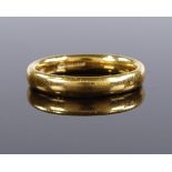 A 22ct gold wedding band, size M, 4.8g