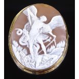 A relief carved cameo brooch, depicting the Archangel Michael triumphs over evil, in unmarked 15ct