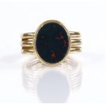 An 18ct gold bloodstone seal ring, with triple band shank, setting height 15mm, size K, 10.3g