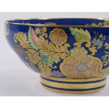 A Spode blue ground china fruit bowl, with gilded floral decoration, diameter 26cm