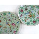 A pair of Chinese celadon porcelain dishes, with painted enamel birds and butterflies, diameter 26cm