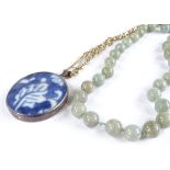 A 14ct gold mounted jade bead necklace, together with a "Nankin" pendant necklace (2)