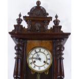 A 19th century Continental carved wood cased regulator wall clock, with enamel dial and 8-day