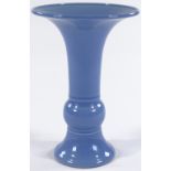 A Chinese blue glaze porcelain vase with flared rim, seal mark under base, height 28cm, rim diameter
