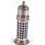 A large cylindrical silver sugar caster, with pierced body and blue glass liner, indistinct maker'