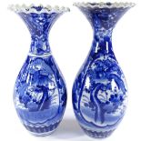 A pair of Chinese blue and white porcelain vases with flared rims and painted decoration, height