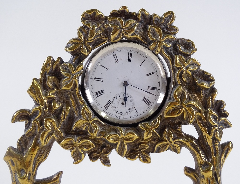 A 19th century brass pocket watch stand, with pheasant design, containing a silver-cased top-wind - Image 2 of 3